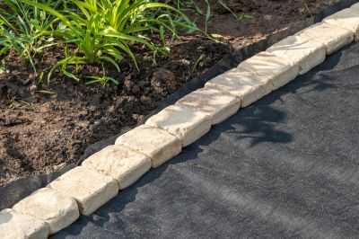 Keep Mulch in the Garden Bed!